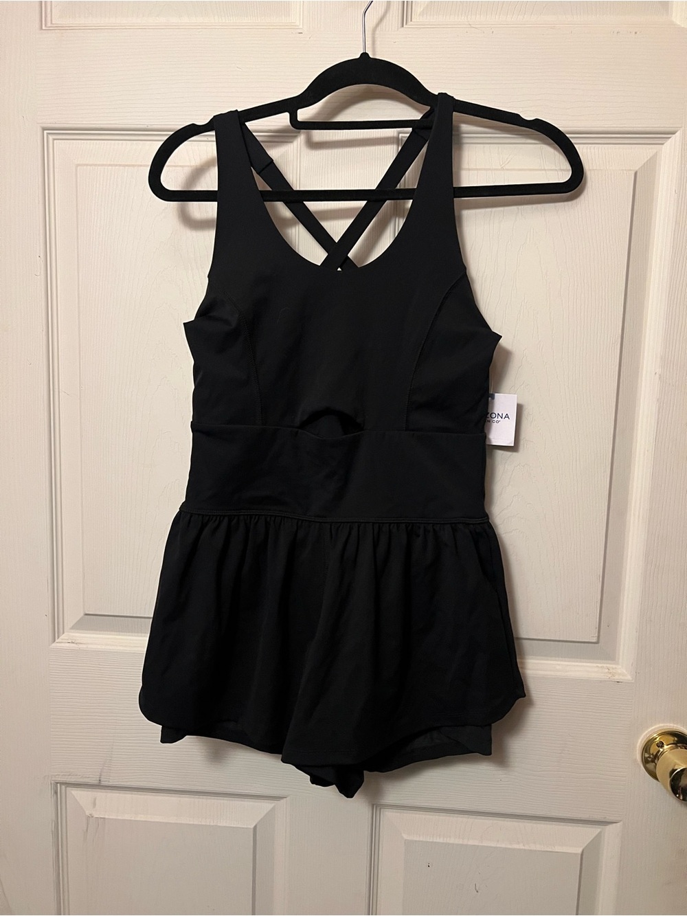 Black athletic romper with keyhole and cross back